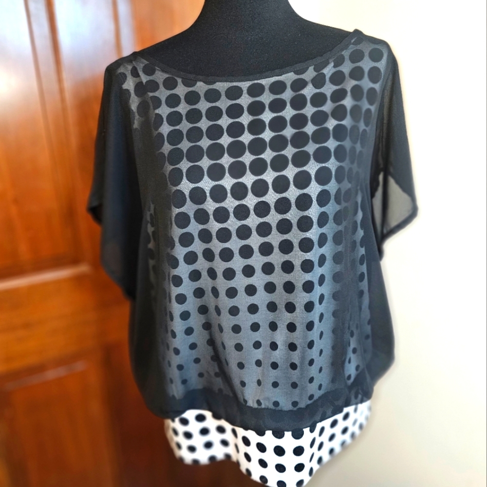 Black and white polkadot blouse